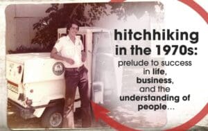 Image of a man leaning on a small white vehicle with a text on the image showing hitchhiking in the 1970s: prelude to success in life, business, and the understanding of people...